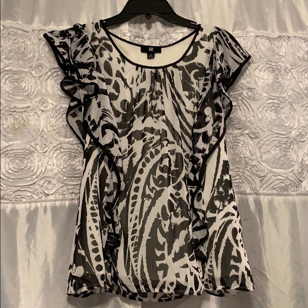 Black and white patterned blouse